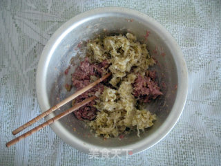 猪肉酸菜蒸饺的做法步骤：7