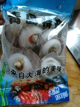 【山东】蒜蓉粉丝蒸扇贝的做法步骤：1
