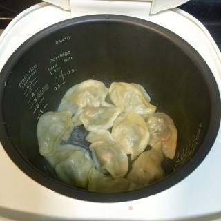 电饭锅焗饺子的做法步骤：7
