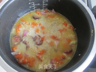 腊肠煲仔饭的做法步骤：7