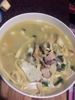 咸肉河蚌豆腐煲的做法步骤：6