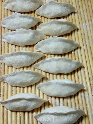 西葫木耳豆腐锅贴的做法步骤：9