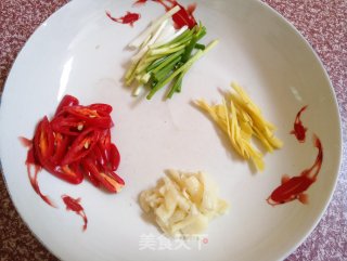爆炒花甲的做法步骤：3
