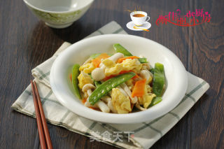 荷兰豆海鲜菇炒鸡蛋的做法步骤：10