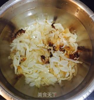 海蜇头拌黄瓜的做法步骤：4