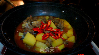土豆烧排骨的做法步骤：15