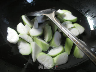 小油豆腐煮夜开花的做法步骤：4