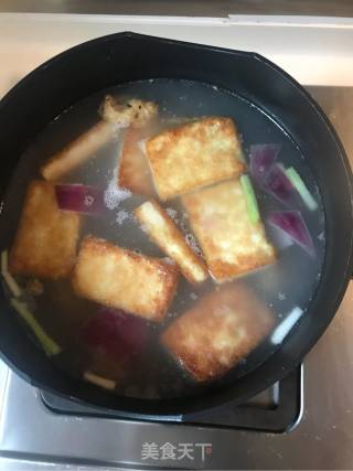 鸡肉油豆皮酸萝卜能量汤的做法步骤：3