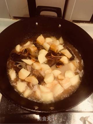 土豆炖脊骨的做法步骤：7