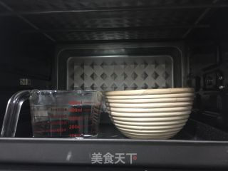 黑芝麻坚果养生欧包的做法步骤：17