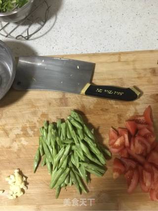 番茄四季豆的做法步骤：1