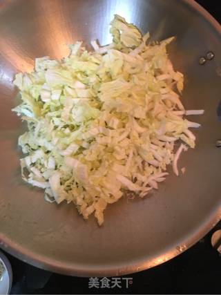 黄芽菜肉丝炒年糕的做法步骤：5
