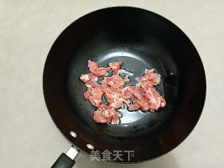 肉片炒鲜蘑的做法步骤：6