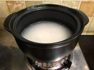 黑乐砂锅鸡肉煲仔饭的做法步骤：8