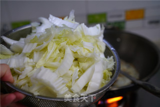 草菇腊味炒年糕的做法步骤：6