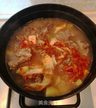 泡菜脊骨土豆锅的做法步骤：7