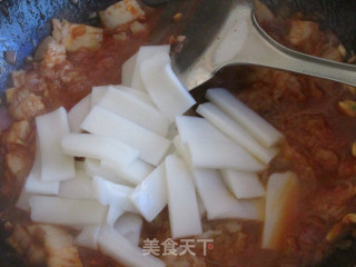 韩式酸菜炒年糕的做法步骤：9