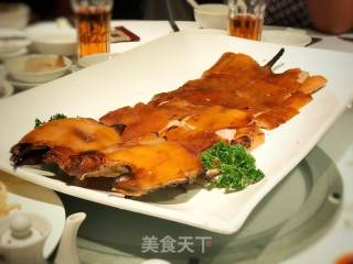 烤乳猪头烩酸菜的做法步骤：1