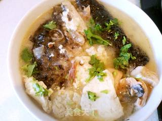 三文鱼头炖豆腐的做法步骤：5