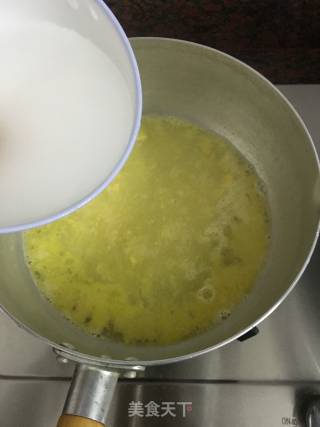 咸蛋黄煨豆腐的做法步骤：11