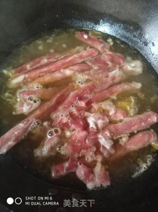 酸汤肥牛的做法步骤：9