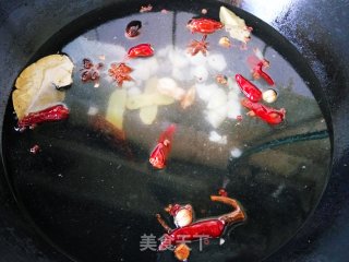 蒜香卤煮毛豆的做法步骤：6