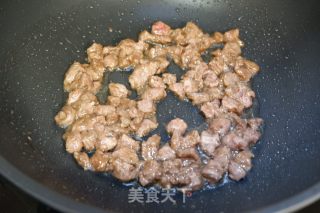 黑椒肉粒炒年糕的做法步骤：9