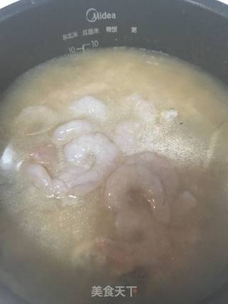 鱿鱼海鲜粥的做法步骤：14