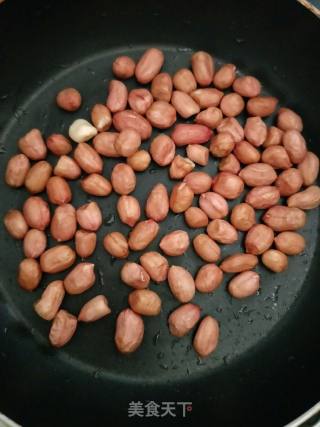 糖霜花生的做法步骤：1