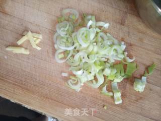 雪里红豆腐炖肉的做法步骤：3