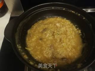 海鲜沙锅粥的做法步骤：4