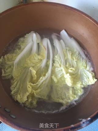 娃娃菜花蛤汤的做法步骤：7