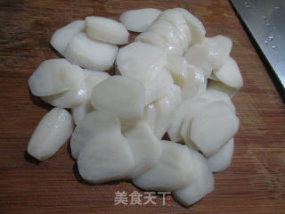 蘑菇腌白菜煮年糕的做法步骤：2