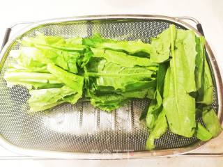 豆豉鲮鱼炒油麦菜（莴笋叶）的做法步骤：3