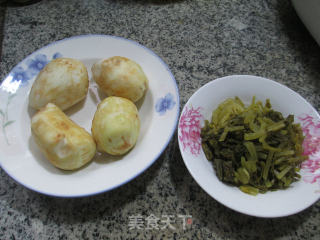 雪菜炒香芋的做法步骤：1
