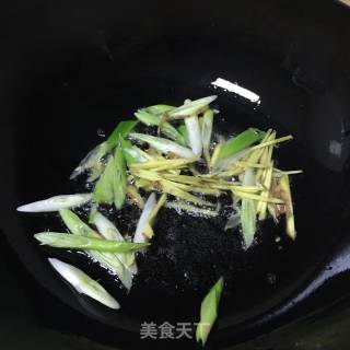 爆炒花甲的做法步骤：5