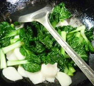 鸡蛋塔苦菜炒年糕的做法步骤：10