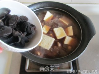 豆腐烧鸡腿的做法步骤：7