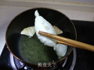 油炸饺子皮的做法步骤：7