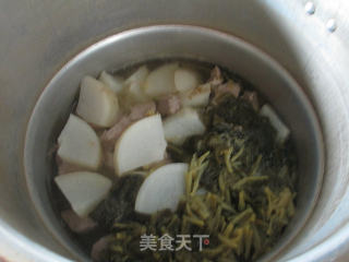 雪菜里脊肉煮萝卜的做法步骤：8