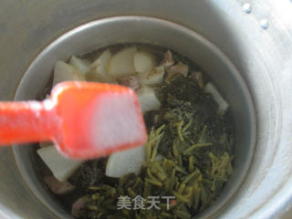 雪菜里脊肉煮萝卜的做法步骤：9