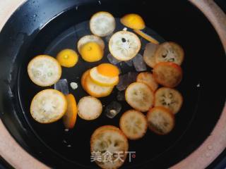 金桔红茶的做法步骤：4