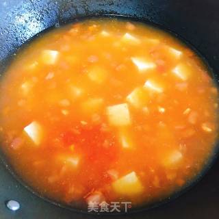 番茄紫菜豆腐汤的做法步骤：6