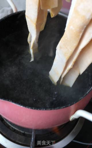 蒜香黄金宽心面的做法步骤：27