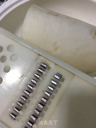 白萝卜炒鲜贝的做法步骤：7