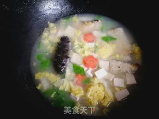 #团圆饭#鱼骨时蔬豆腐汤的做法步骤：9