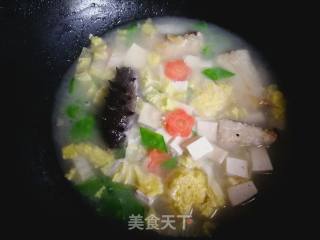 #团圆饭#鱼骨时蔬豆腐汤的做法步骤：10