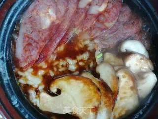 腊肠煲仔饭的做法步骤：7