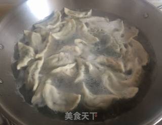 煮冻饺的小炒招的做法步骤：5