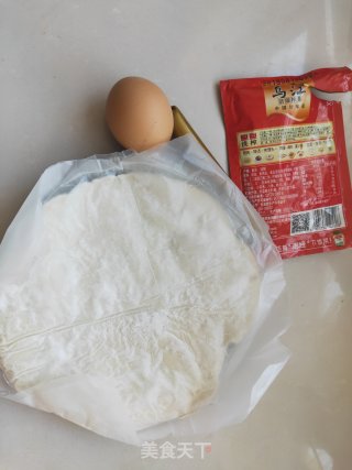 街头手抓饼的吃法----懒人必备早餐的做法步骤：1